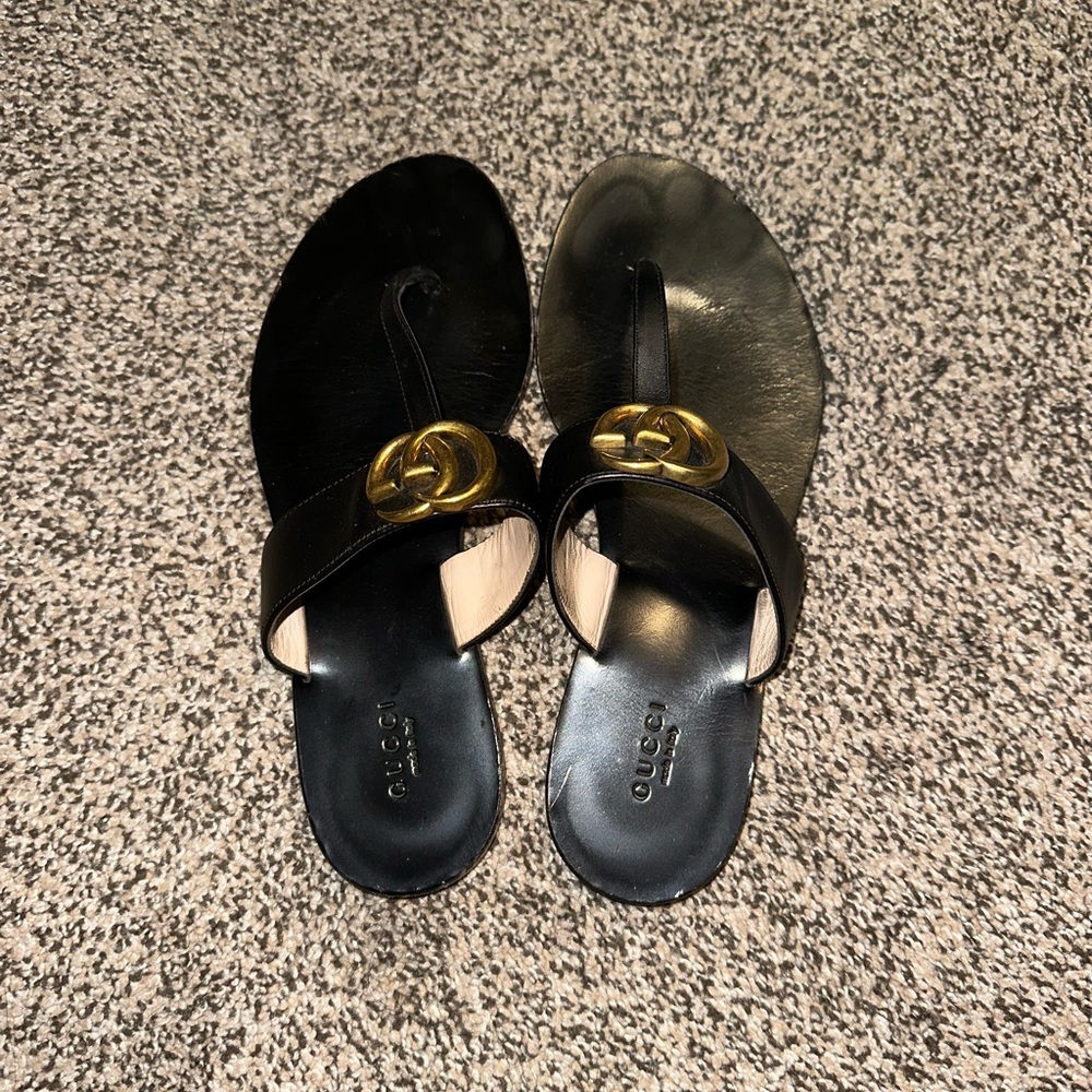Gucci Black Sandals with Gold Emblem